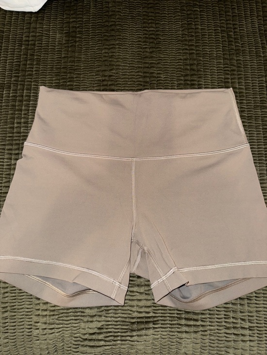lululemon athletica Pants - lululemon athletica WunderTrain high rise Bike Shorts - Light Taupe